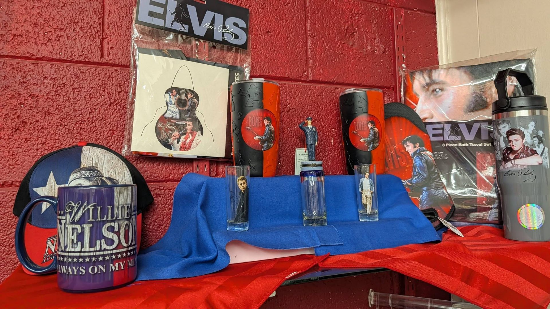 Elvis and Willie Nelson collectible mugs, tumblers, and memorabilia.